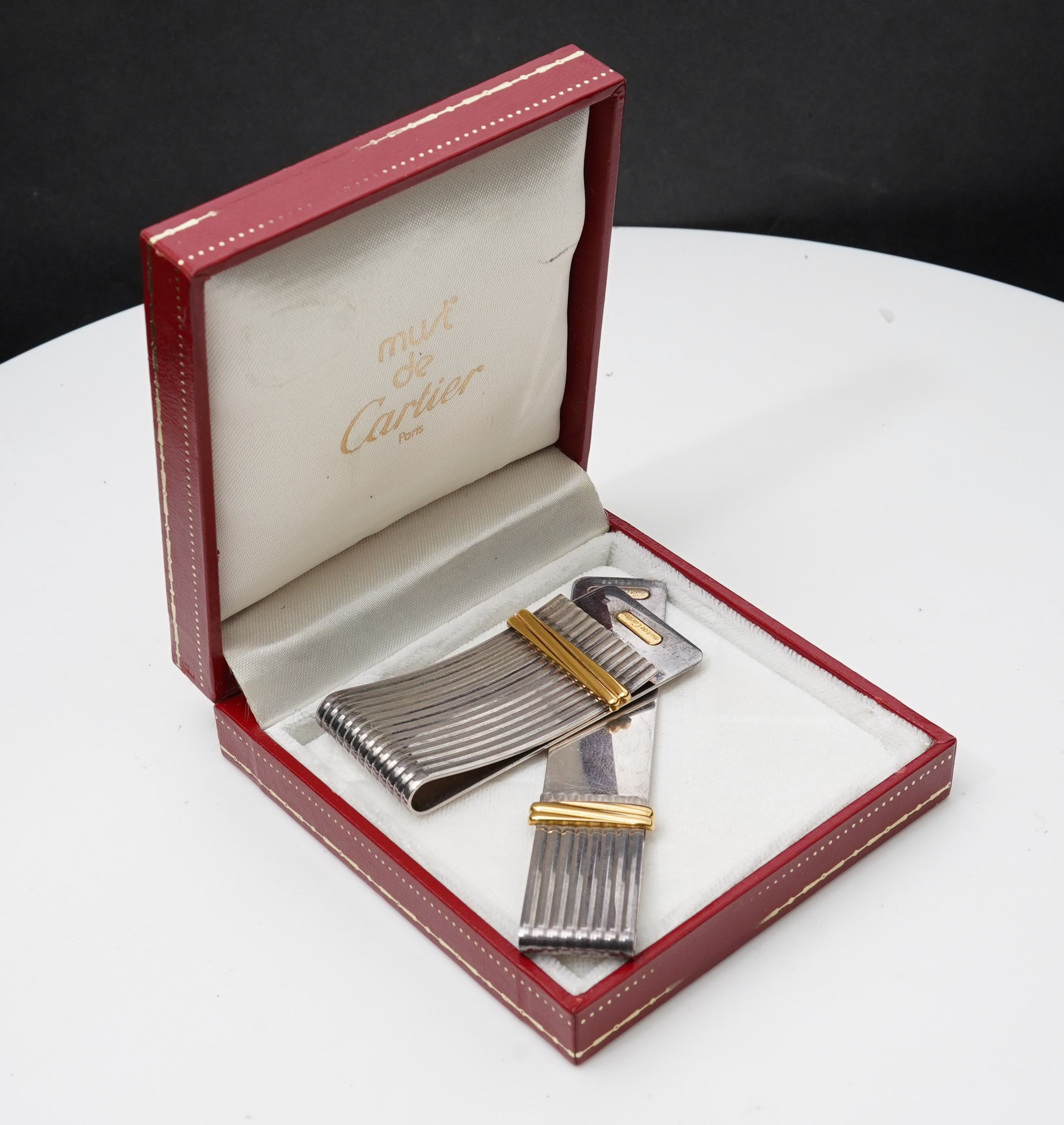 Cartier, two 'Must de Cartier' money clips